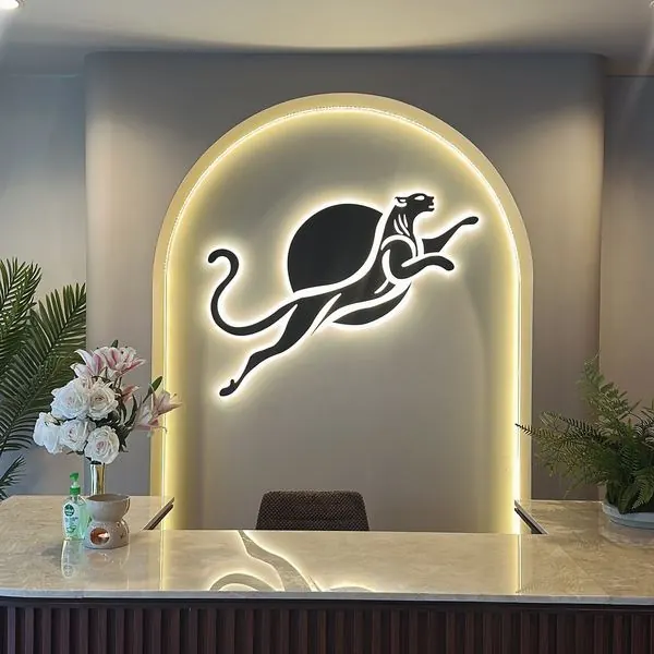Panthera Pilates Studio reception with the signature panther logo